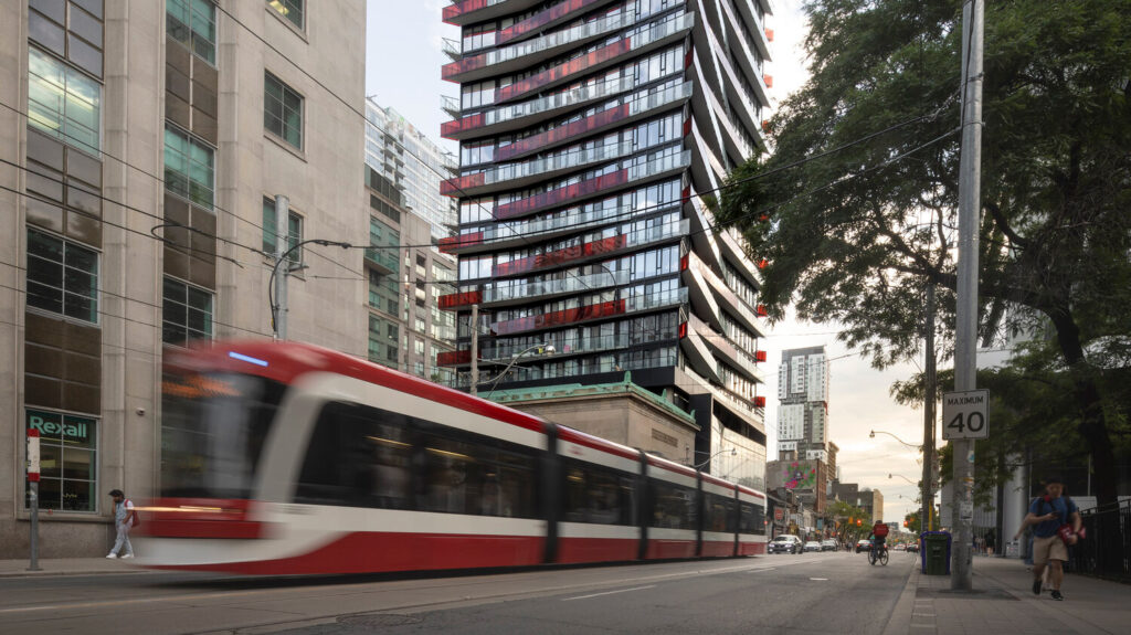 Streetscape of Smarthouse with TTC passing by
